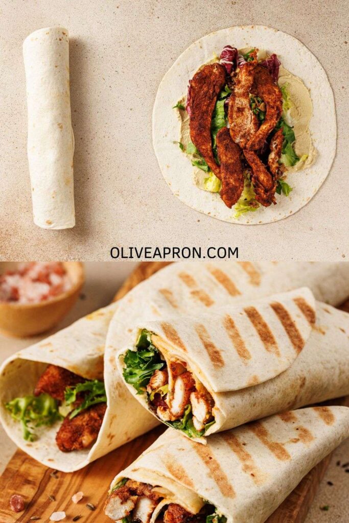 Chicken wraps filled with pieces of chicken breast, humus and lettuce.