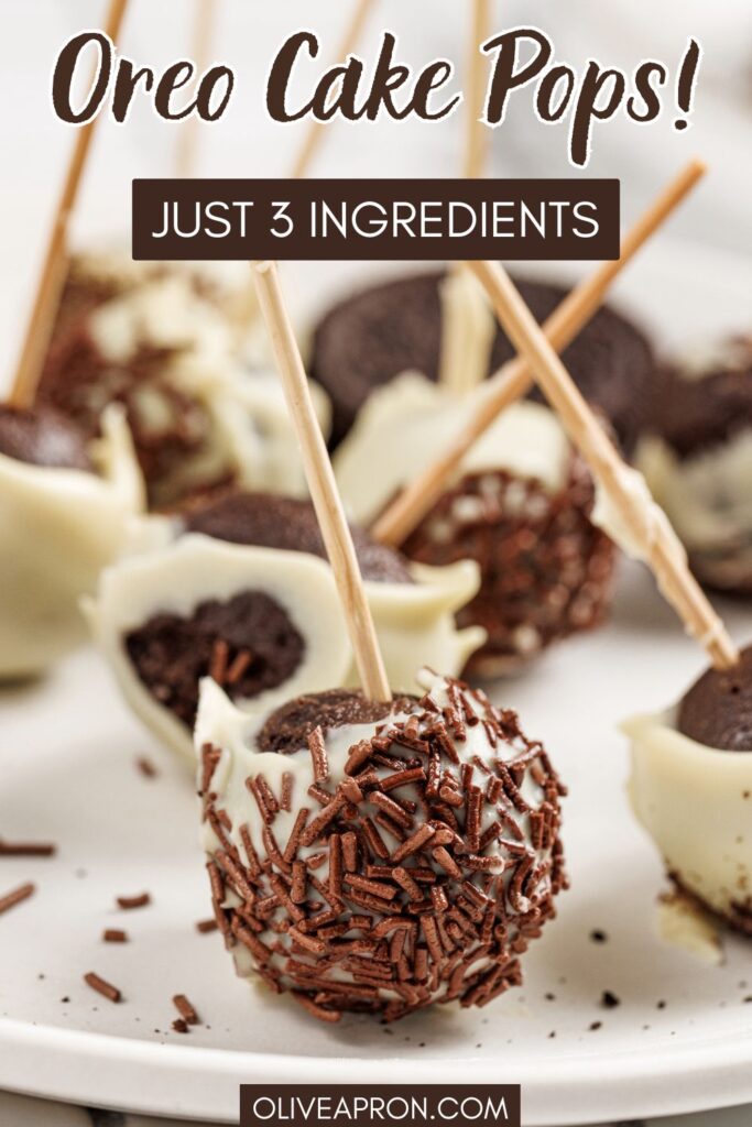 Close up of Oreo cake pops made with three ingredients, coated in white chocolate and chocolate sprinkles.