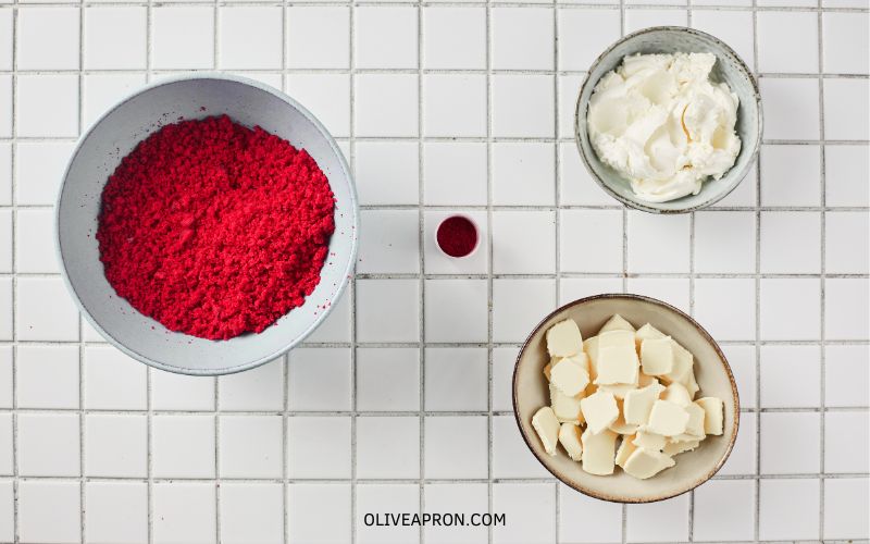 Red velvet cake crumbs with cream cheese frosting.