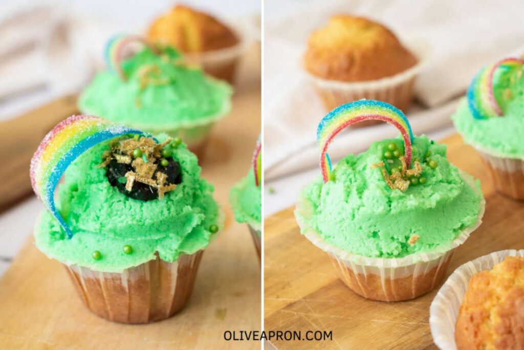 St Patricks Day cupcakes decorated with green buttercream, rainbow candy strips, gold sprinkles, and a chocolate “pot of gold” on top, styled on a wooden board for a festive dessert display.