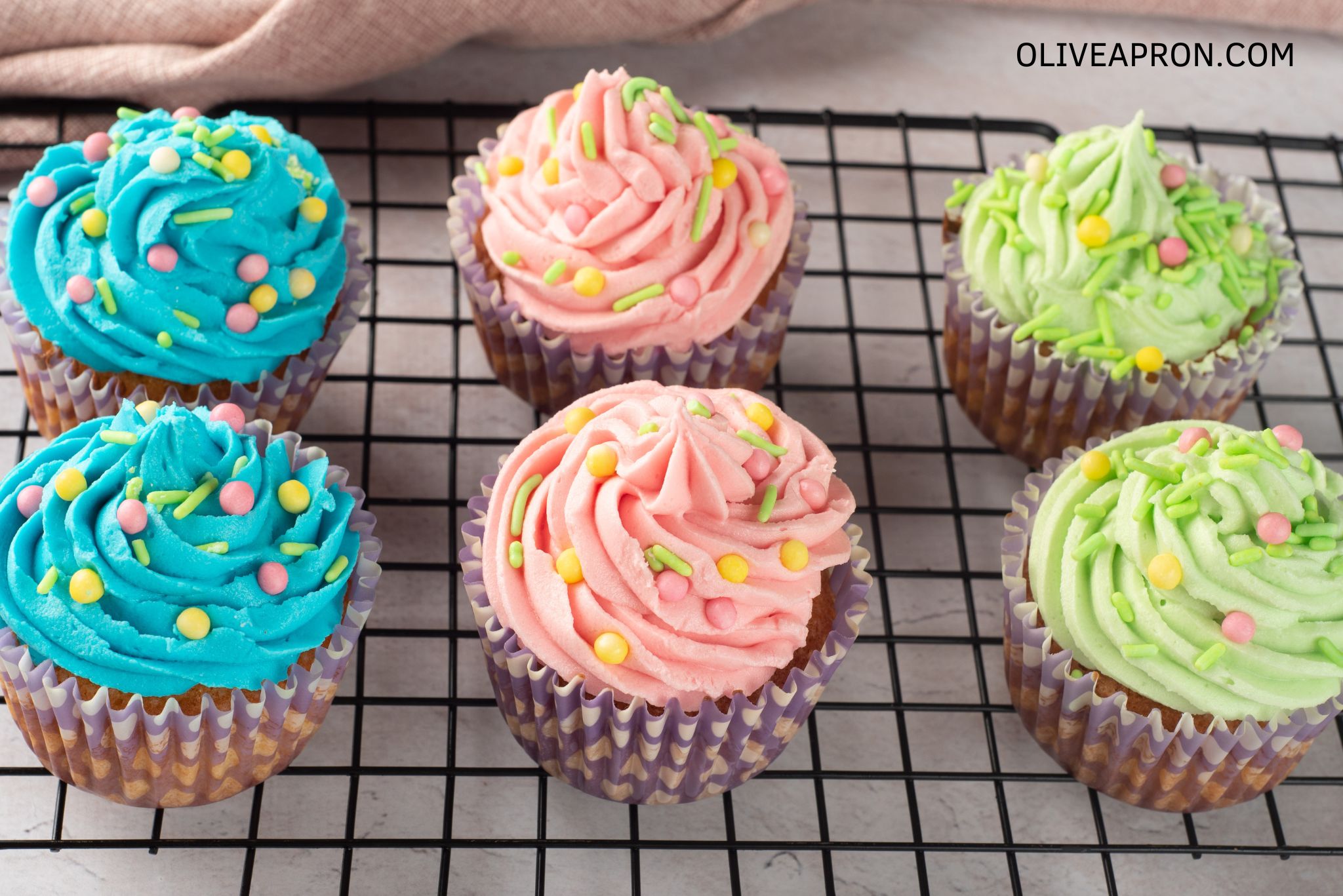 Close up of pastel icing Easter cupcakes