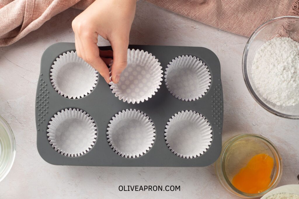 Spring cupcakes liners on muffin tins