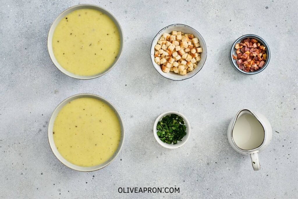 Potato soup on bowla with toppings
