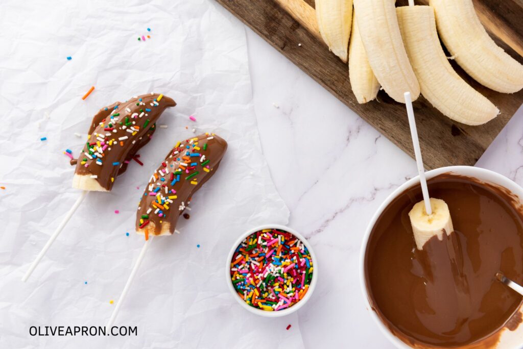 Banana dipped in chocolate and covered bananas with sprinkles