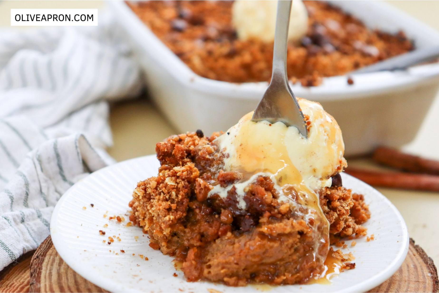 Close up of pumpkin crisp with ice cream and fork
