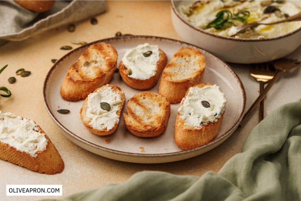 Toasted baguette slices topped with cheese dip