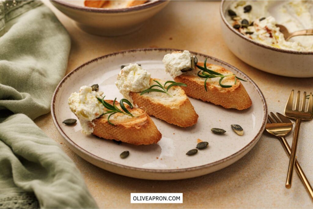 Toasted bread slices with goat cheese dip