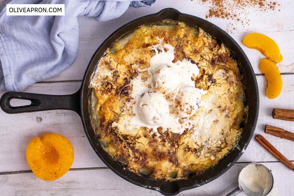 Baked skillet peach dump cake with ice cream